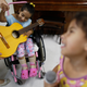 Children with disabling conditions and diseases take part in music therapy class in Sao Paulo, Brazil.